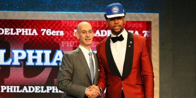 NEW YORK, NY - JUNE 25: Jahlil Okafor poses with Commissioner Adam Silver after being selected third overall by the Philadelp