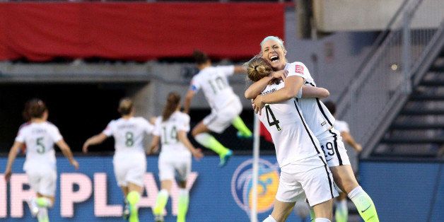 OTTAWA, ON - JUNE 26: Becky Sauerbrunn #4 and Julie Johnston #19 of the United States celebrate after a goal by Carli Lloyd #10 in the second half against China in the FIFA Women's World Cup 2015 Quarter Final match at Lansdowne Stadium on June 26, 2015 in Ottawa, Canada. (Photo by Jana Chytilova/Freestyle Photo/Getty Images)