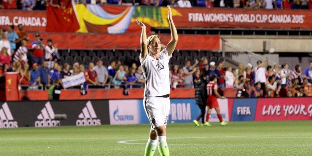 OTTAWA, ON - JUNE 26: Abby Wambach #20 of the United States acknowledges the crowd after defeating China 1-0 in the FIFA Women's World Cup 2015 Quarter Final match at Lansdowne Stadium on June 26, 2015 in Ottawa, Canada. (Photo by Andre Ringuette/Freestyle Photo/Getty Images)