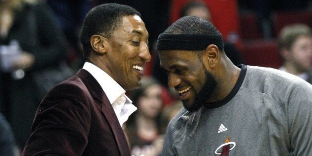 Miami Heat's LeBron James, right, greets former NBA player Scottie Pippen before the start of an NBA basketball game with the Portland Trail Blazers Thursday, March 1, 2012, in Portland, Ore. (AP Photo/Rick Bowmer)