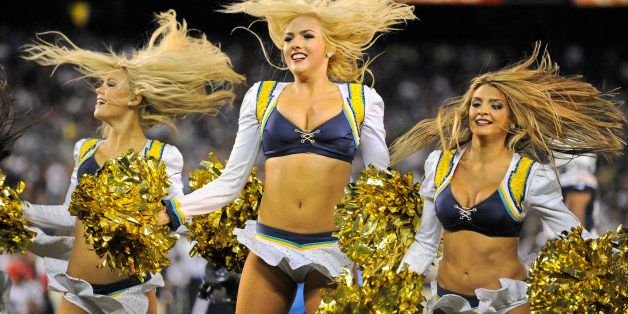 San Diego Chargers' cheerleaders entertain in the second quarter of an NFL preseason football game against the Seattle Seahawks Thursday, Aug. 8, 2013, in San Diego. (AP Photo/Denis Poroy)