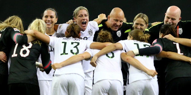 MONTREAL, QC - JUNE 30: Abby Wambach #20 of the United States celebrates after the USA 2-0 victory against Germany in the FIFA Women's World Cup 2015 Semi-Final Match at Olympic Stadium on June 30, 2015 in Montreal, Canada. (Photo by Elsa/Getty Images)