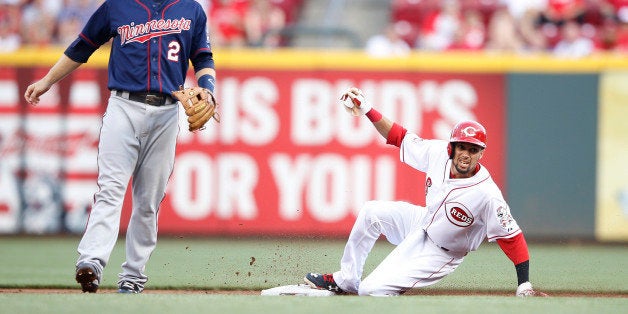 CINCINNATI, OH - JUNE 29: Billy Hamilton #6 of the Cincinnati Reds steals second base in the second inning against the Minnesota Twins at Great American Ball Park on June 29, 2015 in Cincinnati, Ohio. (Photo by Joe Robbins/Getty Images)