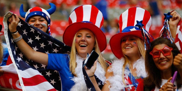 VANCOUVER, BC - JULY 05: Fans of the United States watch warm-ups before the USA takes on Japan in the FIFA Women's World Cup Canada 2015 Final at BC Place Stadium on July 5, 2015 in Vancouver, Canada. (Photo by Kevin C. Cox/Getty Images)