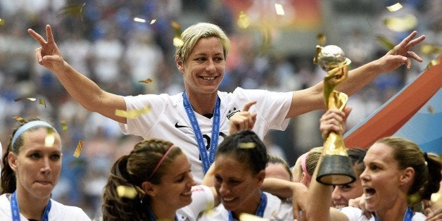 USA forward Abby Wambach (C) celebrates after her teams' win in the final 2015 FIFA Women's World Cup match between USA and Japan at the BC Place Stadium in Vancouver on July 5, 2015. AFP PHOTO / FRANCK FIFE (Photo credit should read FRANCK FIFE/AFP/Getty Images)