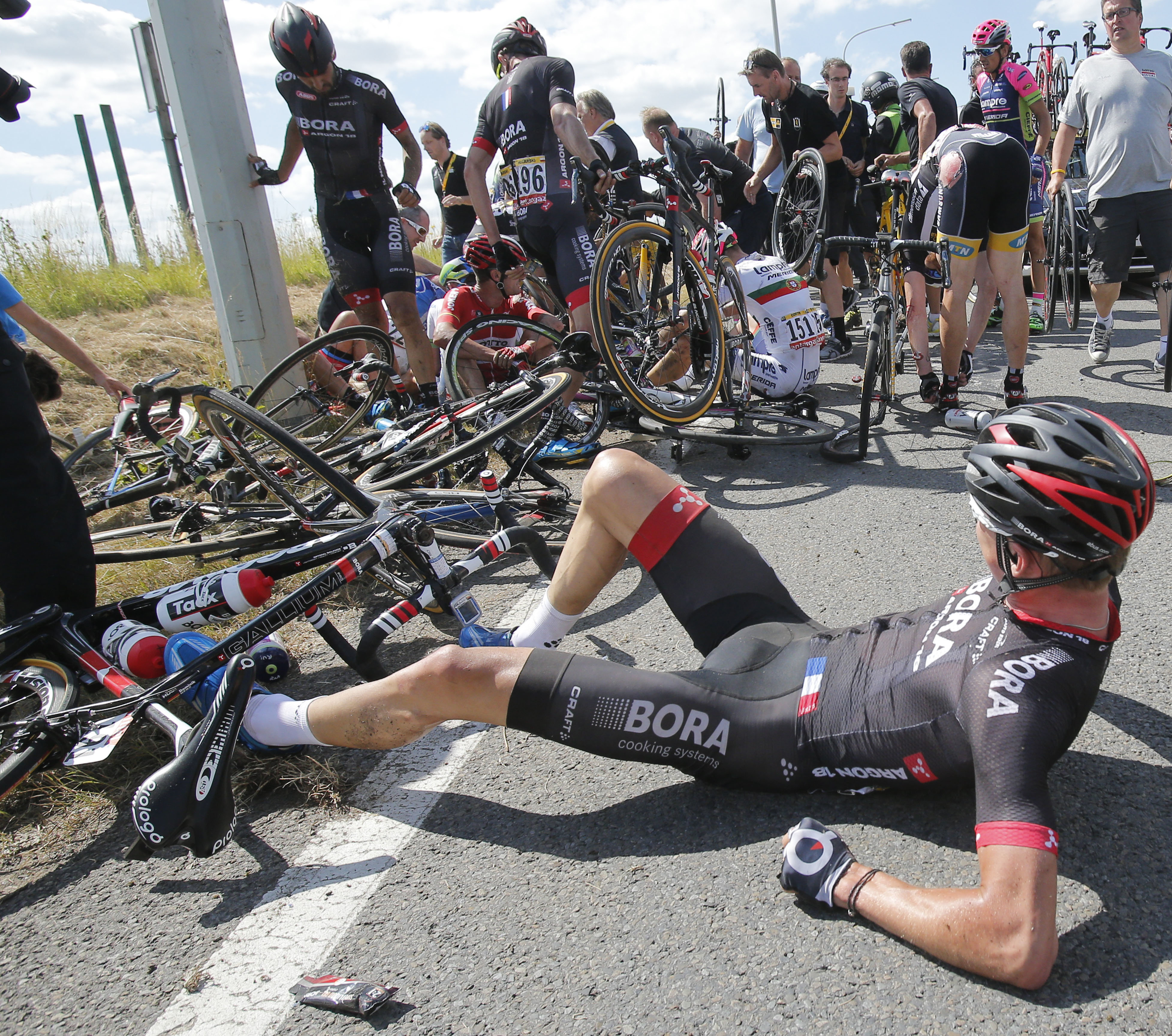 Horrible Tour De France Crash Brings Down 20 Riders, Briefly Stops Race ...