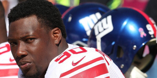 SAN FRANCISCO, CA - OCTOBER 14: Defensive end Jason Pierre-Paul #90 of the New York Giants on the bench in the game with the