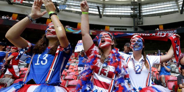 United States fans cheer before the FIFA Women's World Cup soccer championship between the U.S. and Japan in Vancouver, British Columbia, Canada, Sunday, July 5, 2015. (AP Photo/Elaine Thompson)
