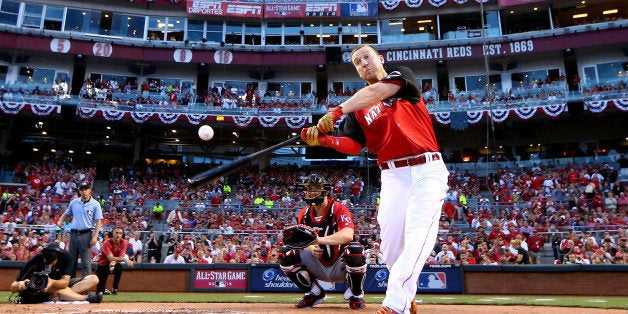 CINCINNATI, OH - JULY 13: National League All-Star Todd Frazier #21 of the Cincinnati Reds bats during the Gillette Home Run Derby presented by Head & Shoulders at the Great American Ball Park on July 13, 2015 in Cincinnati, Ohio. (Photo by Elsa/Getty Images)