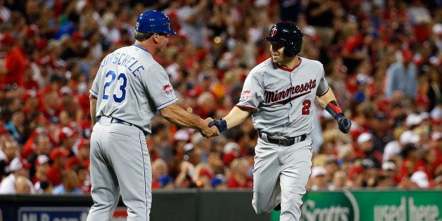 Brian Dozier of the Minnesota Twins celebrates hitting a two-run