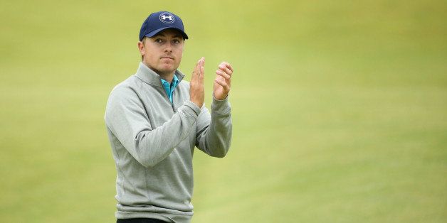 ST ANDREWS, SCOTLAND - JULY 20: Jordan Spieth of the United States acknowledges the crowd on the 18th green during the final round of the 144th Open Championship at The Old Course on July 20, 2015 in St Andrews, Scotland. (Photo by Streeter Lecka/Getty Images)