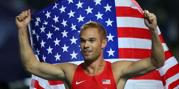 MOSCOW, RUSSIA - AUGUST 13: Nick Symmonds of the United States celebrates winning silver in the Men's 800 metres final during Day Four of the 14th IAAF World Athletics Championships Moscow 2013 at Luzhniki Stadium on August 13, 2013 in Moscow, Russia. (Photo by Mark Kolbe/Getty Images)
