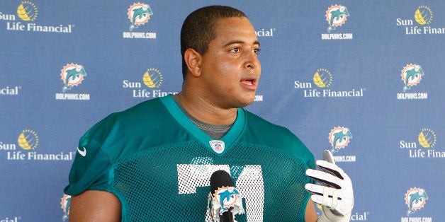DAVIE, FL - MAY 4: Jonathan Martin #71 of the Miami Dolphins talks ot the media after the rookie minicamp on May 4, 2012 at t