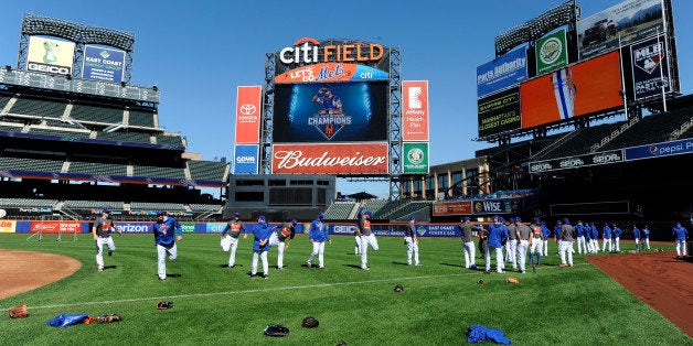 New York Mets players warm up during practice at Citi Field for the NLDS series against the Los Angeles Dodgers, Tuesday, Oct