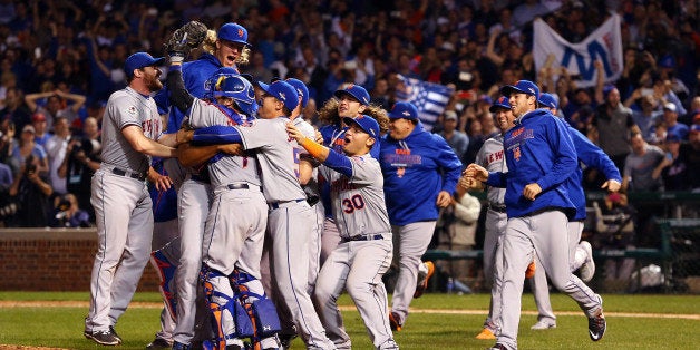 CHICAGO, IL - OCTOBER 21: The New York Mets celebrate an 8-3 victory in Game 4 of the NLCS against the Chicago Cubs at Wrigley Field on Wednesday, October 21, 2015 in Chicago, Illinois. (Photo by Alex Trautwig/MLB Photos via Getty Images) 