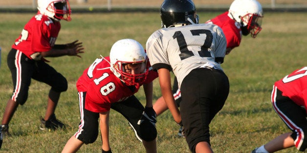 youth football player in a...