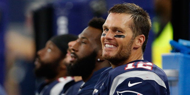 ARLINGTON, TX - OCTOBER 11: Quarterback Tom Brady #12 of the New England Patriots on the sidelines during the second half of