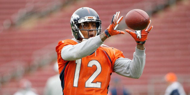 STANFORD, CA - FEBRUARY 03: Andre Caldwell #12 of the Denver Broncos catches the ball during the Broncos practice for Super Bowl 50 at Stanford University on February 3, 2016 in Stanford, California. The Broncos will play the Carolina Panthers in Super Bowl 50 on February 7, 2016. (Photo by Ezra Shaw/Getty Images)