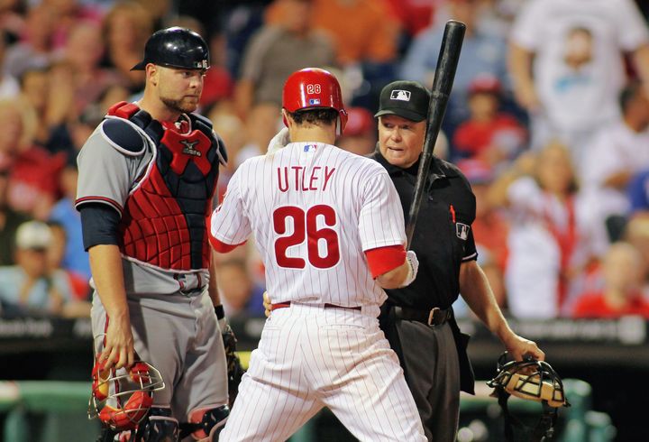 Utley leads Phils' wild chase