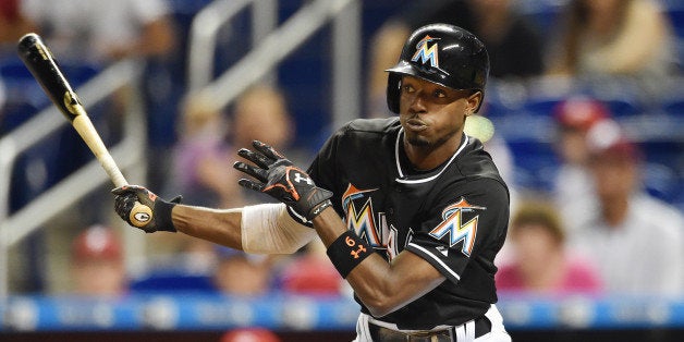 MIAMI, FL - AUGUST 22: Dee Gordon #9 of the Miami Marlins bats during a MLB game against the Philadelphia Phillies at Marlins Park on August 22, 2015 in Miami, Florida. (Photo by Ronald C. Modra/Sports Imagery/Getty Images) 