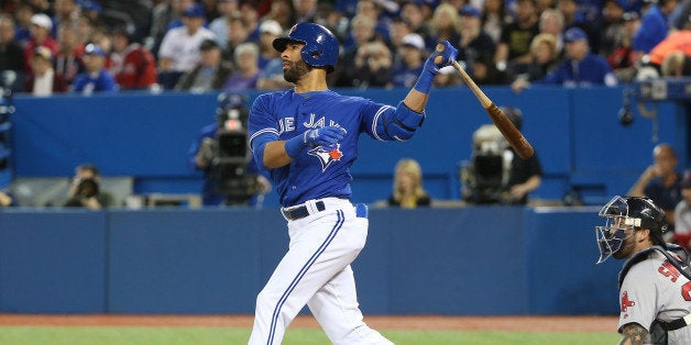 TORONTO, CANADA - APRIL 9: Jose Bautista #19 of the Toronto Blue Jays hits a two-run home run in the first inning during MLB game action against the Boston Red Sox on April 9, 2016 at Rogers Centre in Toronto, Ontario, Canada. (Photo by Tom Szczerbowski/Getty Images)