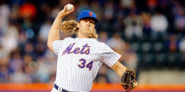 NEW YORK, NY - APRIL 25: Noah Syndergaard #34 of the New York Mets in action against the Cincinnati Reds at Citi Field on Ap