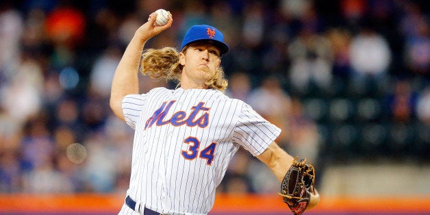 NEW YORK, NY - APRIL 25: Noah Syndergaard #34 of the New York Mets in action against the Cincinnati Reds at Citi Field on April 25, 2016 in the Flushing neighborhood of the Queens borough of New York City. The Mets defeated the Reds 5-3. (Photo by Jim McIsaac/Getty Images)