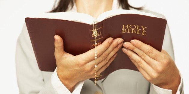 hispanic woman reading bible