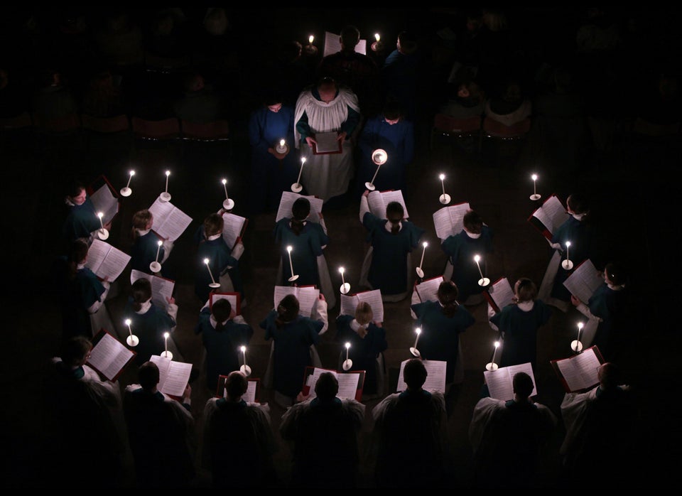 SALISBURY, ENGLAND - NOVEMBER 28: The interior of Salisbury Cathedral is illuminated by candles carried by choristers during