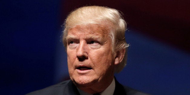 Republican presidential nominee Donald Trump stands on stage during a campaign town hall meeting in Virginia Beach, Virginia,