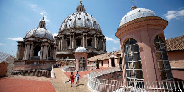 Tourists descend from the roof of St. Peter's Basilica in Vatican City, on Thursday, July 5, 2012. The Vatican Bank has increased efforts to comply with international rules to control money laundering and is committed to transparency, Paolo Cipriani, director general of the Institute for the Works of Religion, said. Photographer: Alessia Pierdomenico/Bloomberg via Getty Images