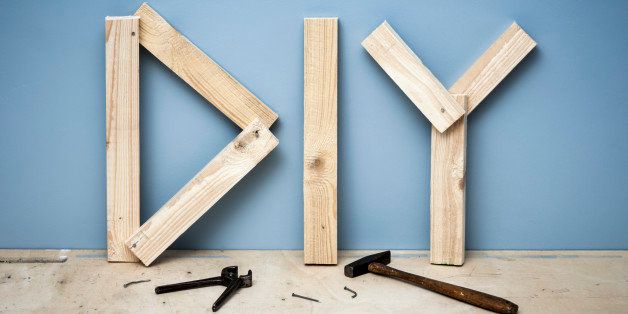 Wooden planks forming the letters DIY for 'Do It Yourself'