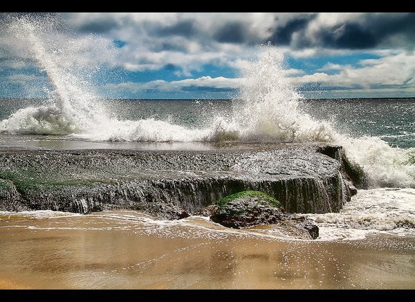 A Grain of Sand by Robert William Service