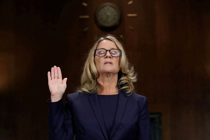 Dr. Christine Blasey Ford is sworn in prior to testifying before the Senate Judiciary Committee on Sept. 27, 2018.