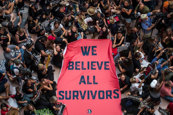 Protestors rally against Kavanaugh in the atrium of the Hart Senate Office Building on Capitol Hill on Oct. 4, 2018.