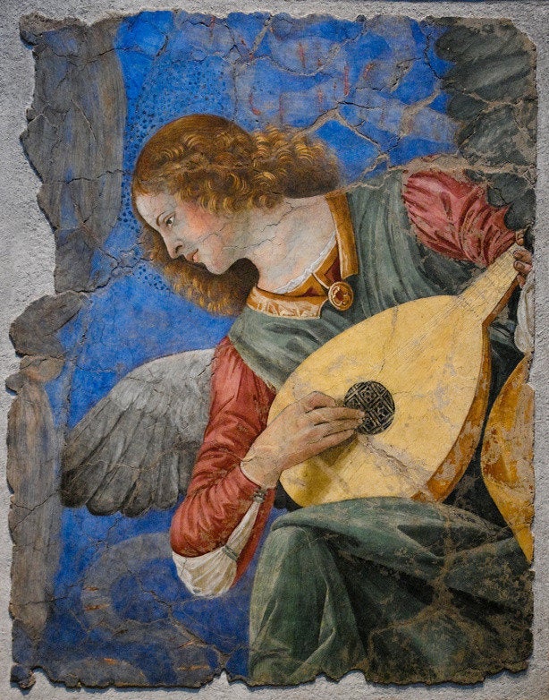 description A fragment of a circa-1480 fresco of an angel with a halo strumming a lute and glancing ... wikipedia | File:Vatican_image. jpg ... 