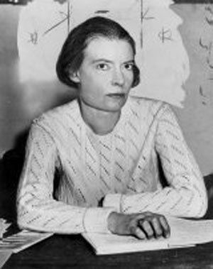 Description en:Dorothy Day | Dorothy Day half-length portrait, seated at desk, facing right | Source New York World-Telegram & Sun ... 