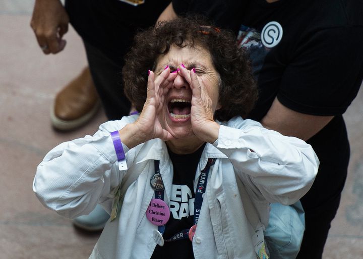 A demonstrator in the Hart Senate Office Building in Washington during a protest against Supreme Court nominee Brett Kavanaugh, Oct. 4.