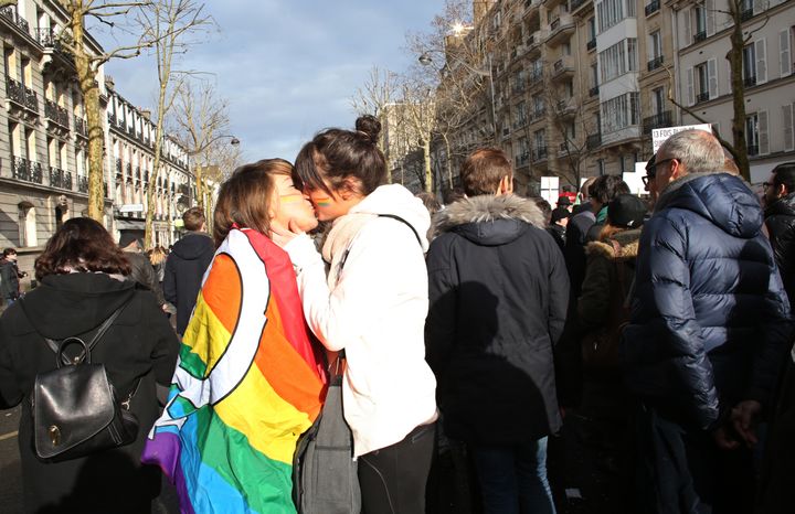 Two women kiss each other during a demonstration for the legalisation of gay marriage and LGBT (lesbian, gay, bisexual, and transgender) parenting, in Paris on January 27, 2013, two days before a parliamentary debate on the government’s controversial marriage equality bill, which will allow gay couples the same rights as their straight counterparts. AFP PHOTO / THOMAS SAMSON (Photo credit should read THOMAS SAMSON/AFP/Getty Images)
