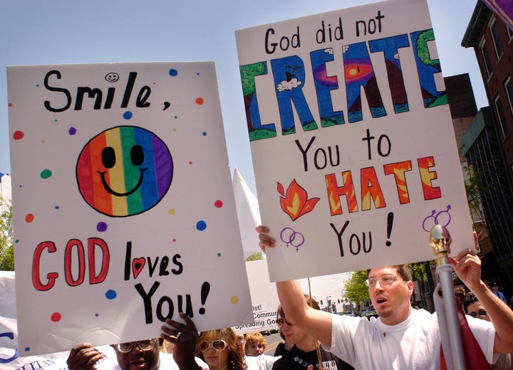 PHILADELPHIA - MAY 1: Activists display signs as they march in support of gay rights during Equality Forum's 40th anniversar