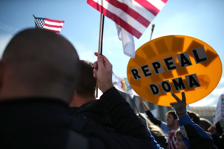 WASHINGTON, DC - MARCH 27: Same-sex marriage supporters rally in front of the U.S. Supreme Court, on March 27, 2013 in Washi