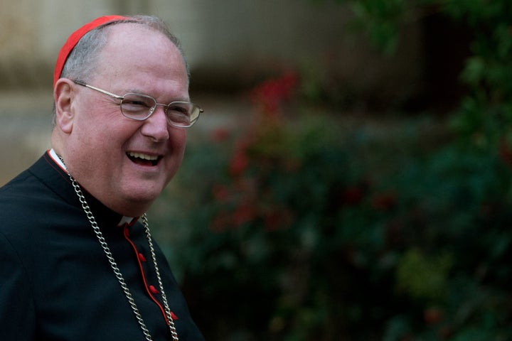 US cardinal Timothy Michael Dolan arrives for a meeting on the eve of the start of a conclave on March 11, 2013 at the Vatica