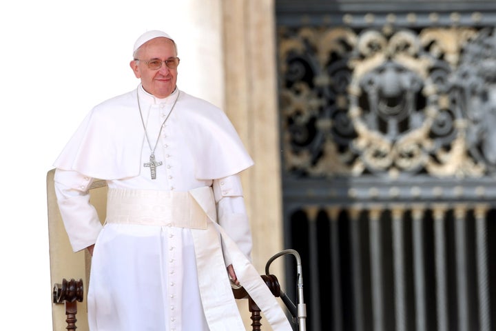 VATICAN CITY, VATICAN - APRIL 03: Pope Francis attends his weekly audience in St. Peter's square on April 3, 2013 in Vatican City, Vatican. Pope Francis delivered his catechism to a crowd of approximately 30,000 pilgrims packed into St Peter's Square. (Photo by Franco Origlia/Getty Images)