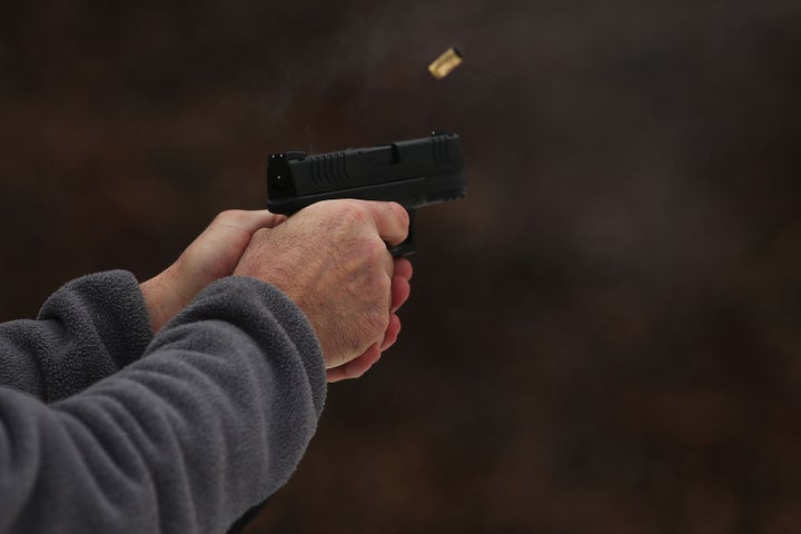 WALLINGFORD, CT - FEBRUARY 24: Students learn to fire their pistols at a class taught by King 33 Training at a shooting range on February 24, 2013 in Wallingford, Connecticut. King 33 Training, a company that trains and educates individuals on the safe and proper use of guns and other uses of protective force, offers classes to marksmen of all levels. The Connecticut company offers training for clients interested in maintaining a safe environment for themselves, their families, and those around them. Connecticut, home to a number of gun manufactures including Colt Defense, is a state with conflicting views on guns and gun ownership. Currently the state has some of the strictest gun control laws in the nation and its current governor Daniel Malloy is pushing for tougher measures following the shootings at the Sandy Hook School. (Photo by Spencer Platt/Getty Images)