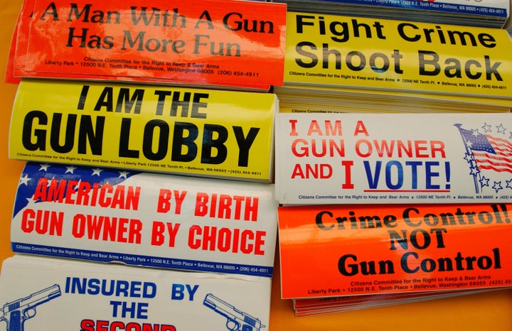 PITTSBURGH, PA - APRIL 15: Bumper stickers hang for sale at the Second Amendment Foundation booth before the 133rd Annual NRA Convention at the David L. Lawrence Convention Center April 15, 2004 in Pittsburgh, Pennsylvania. Firearm retailers and supporters will display their products for the over the weekend. (Photo by Jeff Swensen/Getty Images)