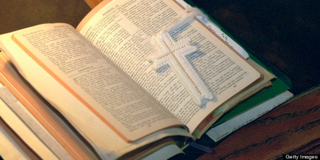 Open bible with cross bookmark