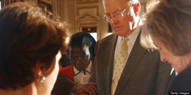 UNITED STATES - MAY 01: NATIONAL DAY OF PRAYER--Dr. James C. Dobson, founder and president of Focus on the Family, his wife, Shirley Dobson, right, who is chairman of the National Day of Prayer Task Force, and other participants in the Cannon Caucus Room (Cannon House Office Building) Observance of the National Day of Prayer gather around past and current members of the United States armed forces to pray for military personnel serving the country. Focus on the Family is a nonprofit organization that produces Dr. Dobson's internationally syndicated radio programs heard daily on more than 3,000 radio facilities in North America and in 15 languages on approximately 3,300 facilities in over 116 other countries. (Photo by Scott J. Ferrell/Congressional Quarterly/Getty Images)