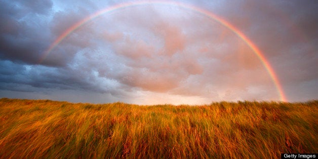 Orange ranbow from evening shower, on a windy day.