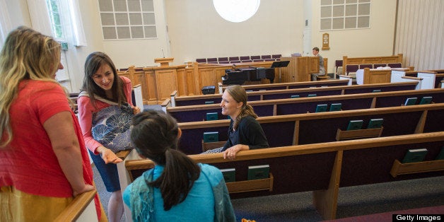 (Cambridge, Mass., - July 22, 2012 ) Members of the Church of Jesus Christ of Latter-day Saints mingle following a sacrament meeting inside the Longfellow Park Chapel, Sunday, July 22, 2012. The Longfellow meetinghouse was Presidential hopeful Mitt Romney's spiritual home for a decade where he rose to the rank of bishop of the Cambridge Ward. Photo by Gretchen Ertl / For The Washington Post via Getty Images)