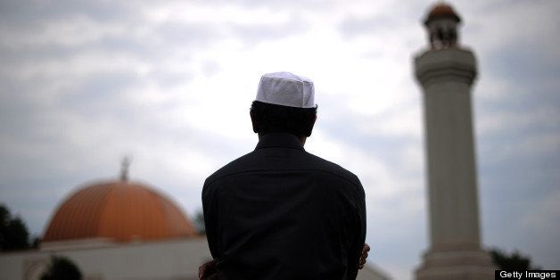 A Muslim takes part in a special morning prayer to start Eid-al-Fitr festival, marking the end of their holy fasting month of Ramadan, at a mosque in Silver Spring, Maryland, on August 19, 2012. Muslims in the US joined millions of others around the world to celebrate Eid-al-Fitr to mark the end of Ramadan with traditional day-long family festivities and feasting. AFP PHOTO/Jewel SAMAD (Photo credit should read JEWEL SAMAD/AFP/GettyImages)